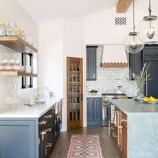 Save valuable counter space by affixing this navy and copper display to the wall. 23 Kitchen Bar And Eat In Counter Design Ideas
