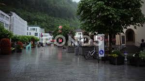 Time Lapse Of Vaduz Liechtenstein People Walking On Shopping Street In Rainy Day Stock Footage Ad Liechtenstein People Walk Shopping Street Cloudy Day Vaduz