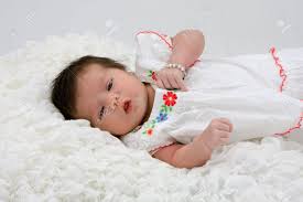 To copy this look, you will need to if you love your brown hair and simply want a little blonde touch to lighten up your features, the answer. Baby With Brown Hair Laying On White Blanket Stock Photo Picture And Royalty Free Image Image 3829157