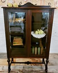 This Dark Oak Antique China Cabinet Has A Great Vintage Look Original Wavy Glass Wooden Caste In 2020 Antique China Cabinets Vintage China Cabinets Oak China Cabinet