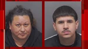 Smuggling suspects arrested after 12 people found packed into SUV, BCSO says