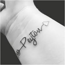The One In Front Of The Gun Lives Forever Meaning Popular Tattoos And Their Meanings Name Tattoos On Wrist Name Tattoos For Moms Tattoos For Kids