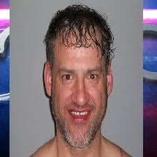 Police: Man struck a neighbor in the face with a brick