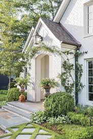 White painted brick house black exterior window trim. White Painted Brick Exteriors Alternatives Life On Virginia Street