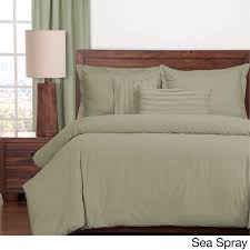 The comforter set has 8 pieces in it includes one flat solid color sheet, one camouflage fitted sheet, four pillowcases, one comforter, and a bed skirt. Home Garden Comforters Bedding Sets Luxurious Beige Pleated Medallion Reversible Comforter Curtain 24 Pcs King Queen