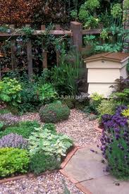 Speaking Of Bees Make Sure To Provide Them A Home For Pollinating Your Flowers With A Hive In Herb Garden Planting Flowers Garden Paths Bee Garden