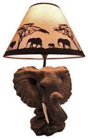 African vintage chess piece table lamp hand carved in iroko wood d10cm x h60cm$549.00. I Love This Lamp It Fits The African Safari Theme 110 African Safari Decor Elephant Decor Living Room Elephant Art