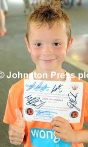 25015305-Pictures Martin Bostock Schoolchildren from Blackpool schools at a  special party at Blackpool football club to celebrate their 100%  attendance. Bethany Middleton of Stanley school.