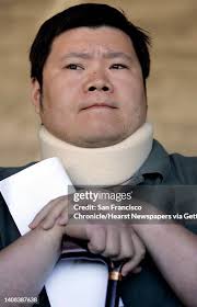 lee22_109_pc.jpg Julie Lee's son Andrew Lee wore a neck brace and... News  Photo
