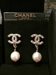 Maybe you would like to learn more about one of these? Pin By K Carlile Waller On Weddings Chanel Earrings Chanel Jewelry Chanel Fashion Show
