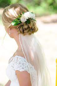 Wedding Updo With Flowers Love How My Veil Went Under So That It Didn T Damage The Flowers Wedding Romantic Wedding Hair Veil Hairstyles Wedding Hair Flowers