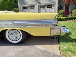 Image result for Starlight Yellow 1957 Pontiac
