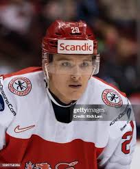 Jonathan Brinkman of Denmark protects the puck from Filip Kral of the...  News Photo