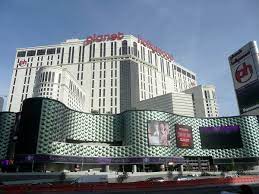 It closed at the end of the year and was sold to kings crown inns of america, a hotel chain which reopened the property a month later as the king's crown tallyho. Planet Hollywood Las Vegas Wikipedia