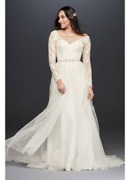 With over 30 years of experience, their philosophy is to be an all inclusive bridal shop and their team strives to make that happen. Long Sleeve Wedding Dress With Low Back David S Bridal