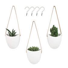 Hanging planters are perfect for small, compact spaces, as it. Cesun 3 Pcs Ceramic Wall Hanging Planter Indoor For Succulent Cactus Air Plants House Hanging Pots Set With Beige Rope And Hooks Wall Decor Buy Online In Bahamas At Bahamas Desertcart Com Productid