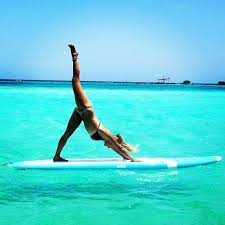 Yoga On Water Brilliant Stand Up Paddle Boarding Is On My Bucket List Paddle Board Yoga Surfing Standup Paddle