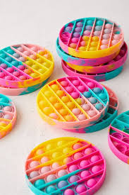 They're typically made of colorful plastic or metal and are small enough to carry around in a pocket or a backpack, which means they can easily be used in an. Tie Dye Go Pop Game Urban Outfitters