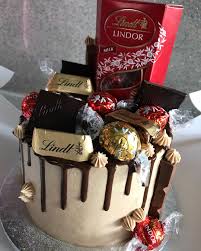 Lindt Cake Covered In Lots Of Lindtuk Choc Lindt Cake Cake Cover Food