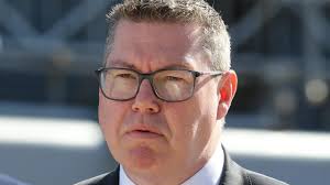 Defence Industry Minister Pat Conroy says he was not speaking to delegates  at conference when he called AUKUS opponents 'appeasers'