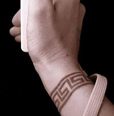 Key , cancer ribbon and star design tattoos are mostly preferred by men. Greek Key Tattoo Lovetoknow