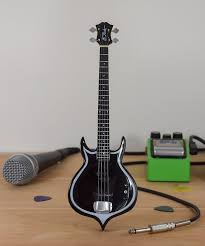 Gene simmons cort style axe bass guitar 4 string signature rock kiss firehawk. Kiss Gene Simmons Bc Rich Punisher Bass Mini Guitars