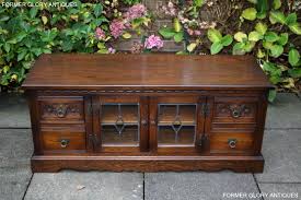 Check spelling or type a new query. A Wood Brothers Old Charm Carved Light Oak Tv Cabinet Stand Base Former Glory Antiques