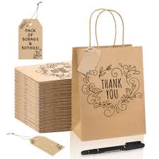 On the front of the bag, the words thank you in cursive font have been hot stamped in gold metallic foil. Thank You Gift Bags 50pcs Medium Brown Kraft Paper Bags With Tags And Pen 8 25 4 25 10 25 In For Retail Shopping Wedding Birthday Party Buy Online In Guernsey At Guernsey Desertcart Com Productid 214241500