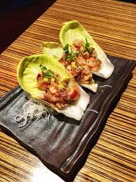 Grilled fish with cabbage and fresh sauces. Paper Thin Pesce White Fish Picture Of Soma Sushi Houston Tripadvisor