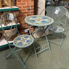 What are some popular product styles within bistro sets? Cancun Iron Bistro Set With Mosaic