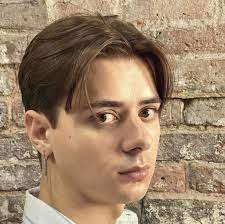 Find the look that no hairstyle for men channels the 1990s vibe like curtain haircut. The Curtain Haircut 90s Hair And Now