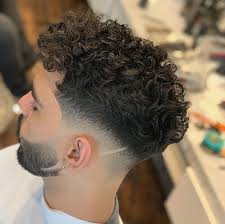 Instead of dropping down, this mid bald fade follows a line around the head below the crown. Men S Curly And Wavy Haircuts For 2021 New Old Man N O M Blog