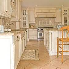 Shaker style cabinets and raised and recessed panel cabinets offer a more traditional kitchen cabinet look, while flat panel cabinet doors tend to lend more to the modern and contemporary style. 14 Best Kitchen With Tile Floor Ideas Kitchen Remodel Kitchen Design Home Kitchens
