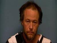 Saline County man arrested in crossbow death