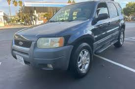 Image result for Satin Silver 2003 Escape