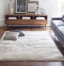 Give Your Living Room A Softer Look With A Faux Sheepskin Area Rug You Can Enjoy The Luxury Of A Real S Home Rugs Rugs In Living Room Small Living Room