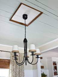 To prep the ceiling for the medallion installation, first, prime the ceiling inside the tape lines. Easy Diy Ceiling Medallion Hgtv