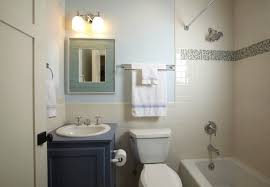 This bathroom creates a feeling of luxury and warmth with its rich green walls and deep dark cabinets. Small Bathroom Ideas 5 Space Smart Strategies For Diyers Bob Vila