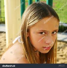 Kid On Playground Glaring Stock Photo 1608550