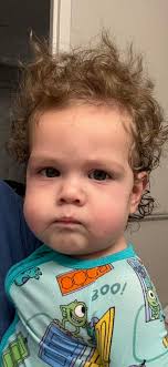 It's Photo Caption Friday! Come up with a clever caption for this photo of  Sassafras the screech owl staring at his mealworm and we will choose our  favorite. The winner will receive