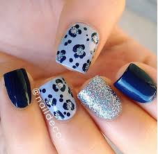 Navy Blue Silver Glitter And Leopard Printed Nails Leopard Nails Blue Nails Trendy Nails
