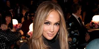 Jennifer Lopez Sneaks Into the 2025 Grammys In a Sheer Sequined Skirt