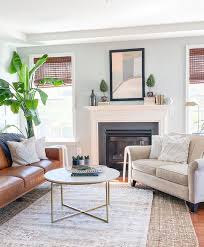 The Simple Art Of Rearranging Cottage Style In 2020 Rearranging Furniture Cool Rugs Decorating Coffee Tables