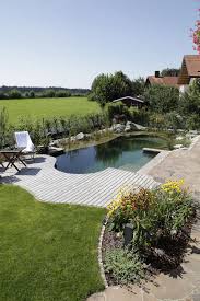 30 Breathtaking Natural Swimming Pools By Biotop Mit Bildern Schwimmbad Landschaftsbau Hinterhof Pool Schwimmteich Selber Bauen