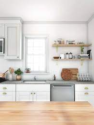 Confront Your Kitchen Remodel With Decisive Pride Simple Gray Tones And A Classic Country Kitchen Layout Sim Kitchen Layout Kitchen Design White Kitchen Decor
