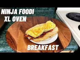 Ninja Foodi Xl Pro Air Oven Breakfast Sandwich Naan Bread Bacon Egg And Cheese Youtube Oven Recipes Breakfast Air Fryer Oven Recipes