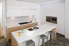 white and oak handleless kitchen