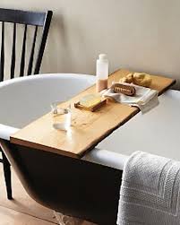 Bamboo wood bath tray, bath caddy bathtub bathroom wooden tray, bath rack for tub, book & tablet bath accessories holder, home spa estalaskincare 5 out of 5 stars (141) $ 64.99 free shipping add to favorites bathtub tray, bath tray. Diy Bathtub Tray Desk From A Wood Board Tub Tray Diy Bathtub Bathtub Tray