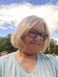 Happy hippies share 1974 graduation picture