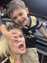 When you take your kids to the Saints game.... (and try to get a picture)